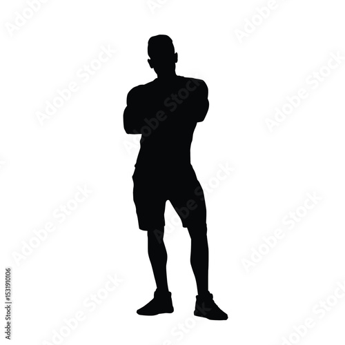 Silhouette of a Man Standing with Arms Crossed