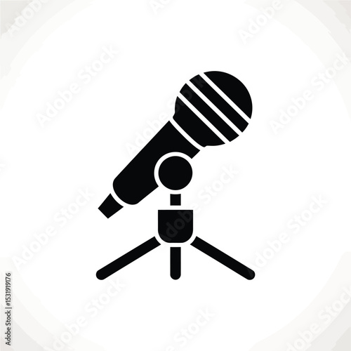 Microphone on tripod stand icon graphic