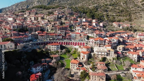 Arachova mountain town, uphill houses, cobbled streets, Greek National Highway 48, Boeotia, Drone shot, Establishing