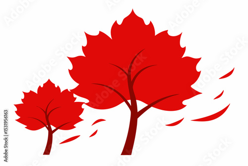 Two red trees with falling leaves in autumn