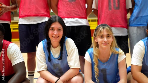 Young basketball players posing for team photo