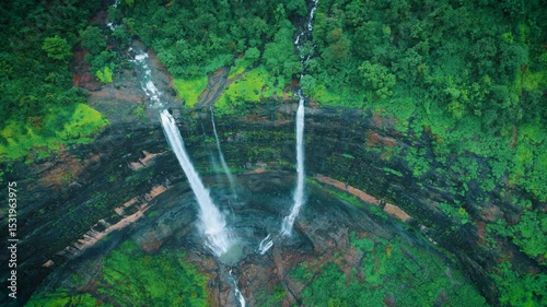 4K Drone shot of Beautiful Kataldhaar waterfall flowing in Ulhas valley near Lonavala, Maharashtra, India. Monsoon waterfall in Sahyadri hills. Nature landscape. Travel background.