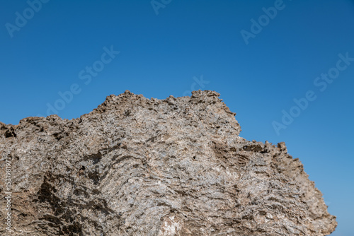 Sandstone / Beachrock, Beach deposits (Holocene) . Kaʻena Point Trail（North), Oahu Hawaii.  Chiefly cream-colored and calcareous in composition, derived from comminuted coral, shells, and foraminifera