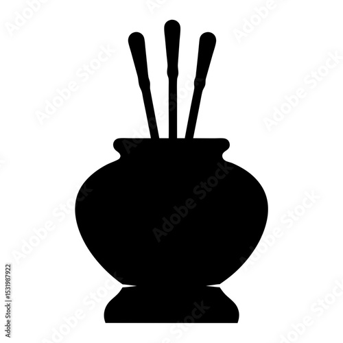 Silhouette of vase containing three sticks used for aromatherapy purposes