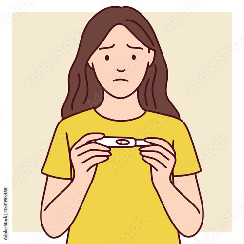 Sad woman in yellow shirt holds a negative pregnancy test. Represents disappointment, emotional pain, and fertility struggle