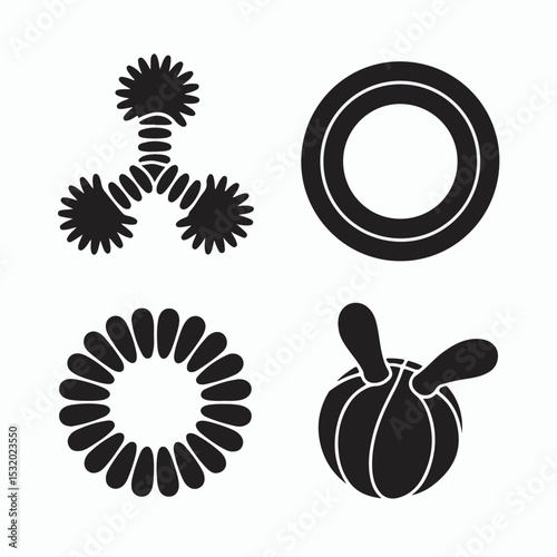 Set of four abstract black and white floral or plant-like elements presented on a bright white background perfect for design