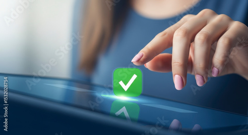 Woman's Hand Touching Digital Tablet With Green Check Mark Confirmation Symbol on Blue Screen