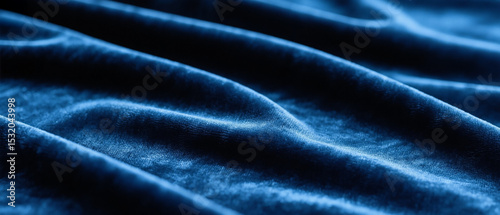 Deep navy blue velvet texture with rich, luxurious feel and soft light reflections. Perfect for elegant backgrounds, fashion design, branding, and sophisticated digital projects.

