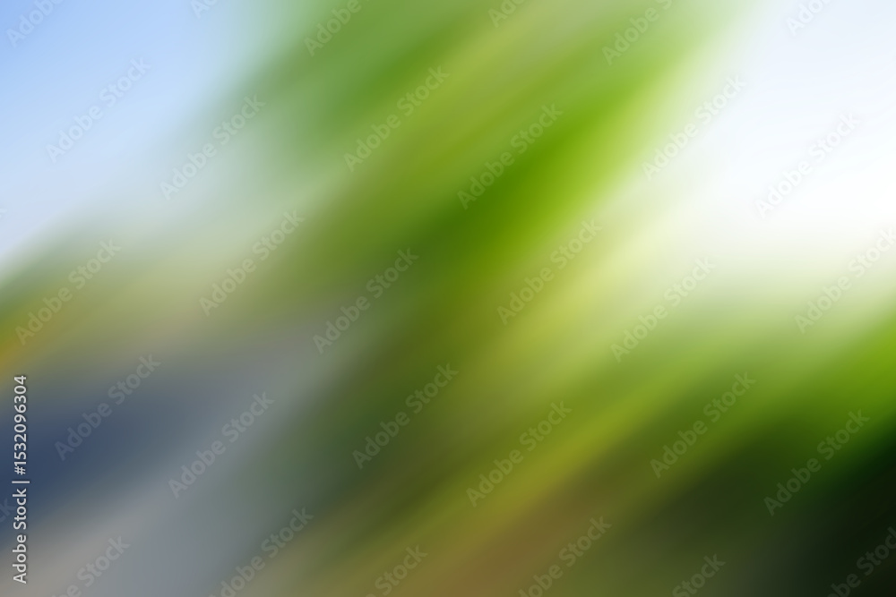 Obraz premium Blur green gradation abstract background with white and blue colors. Copy space. Green bokeh backgrounds. Abstract backdrop.