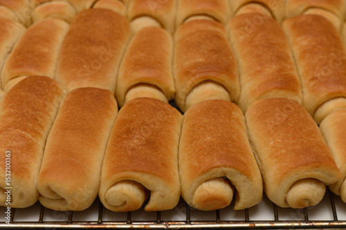 Freshly Baked Parker House Rolls on Kitchen Countertop Cooling