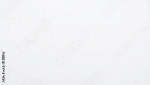 A completely white background with subtle textures and variations in tone across the surface area