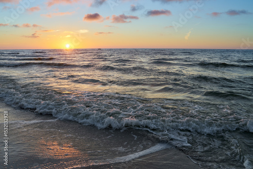 Beautiful sunset over Baltic sea. Summer landscape of polish sea.