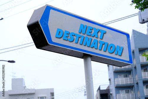 text of NEXT DESTINATION on sign board 