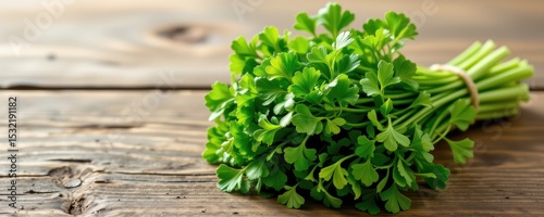 fresh coriander leaves bundled and laid on table, used in summer soups and detox, soft natural light.