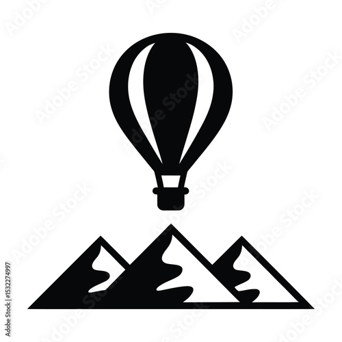 Hot air balloon over desert mountains icon