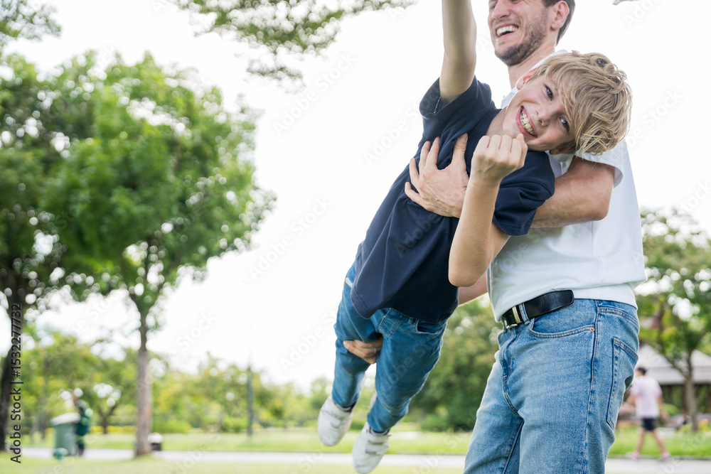 Fototapeta premium Happy family parent children having picnic outdoor activity. Enjoy happiness moment summer playing together including father mother son and daughter relaxing in the morning sunrise.