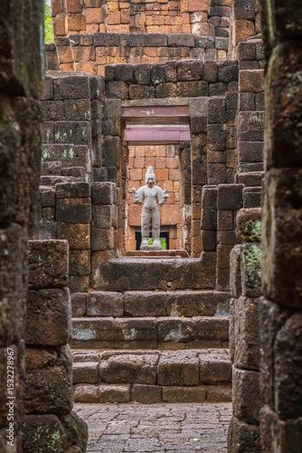 Ancient Hindu statue inside Mueang sing castle at temple in Kanchanaburi Thailand