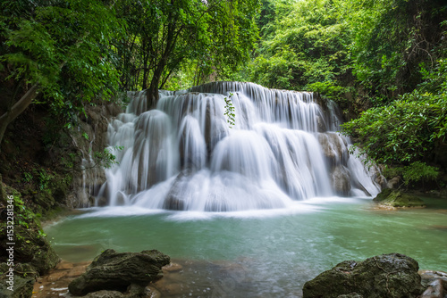 Tropical waterfall at Huay Mae Khamin national park in lush rainforest, Tier 3 Wang Na Pha, Kanchanaburi, Thailand