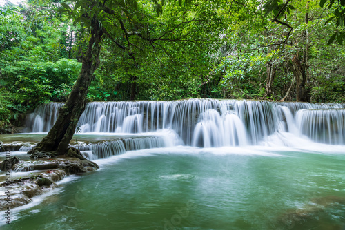 Lush green forest waterfall in Huay Mae Khamin National Park, Kanchanaburi, Thailand