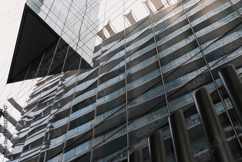 Abstract office tower reflections in corporate architecture with blue glass and steel grid, clean visual for business, finance and commercial design background