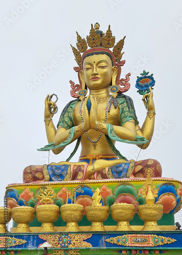 A 35 ft tall golden statue of Buddhist saint Avalokiteshvara (Chenrezig) at Chittray near Tumling in Darjeeling. He is the deity among the tenth-level Bodhisattvas associated with great compassion.