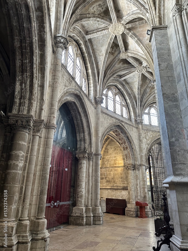 A large ornate building with arched windows A large ornate building with arched windows