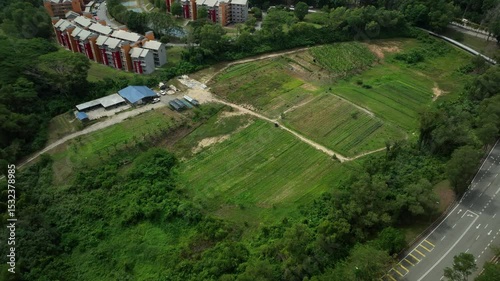 Urban green space development in a residential area with farmland and nature surrounding