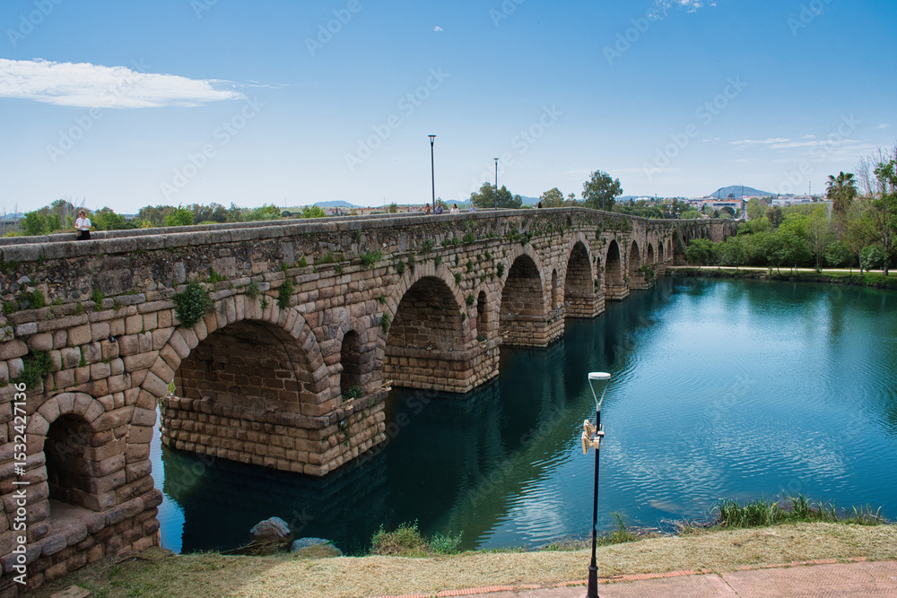 Fototapeta premium Walking with the Romans: The Timeless Bridge of Mérida