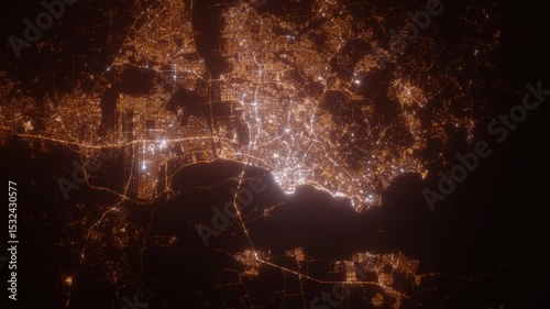 Porto Alegre (Brazil) top view at night. View on modern city from satellite. Camera is zooming in, rotating counterclockwise. Vertical video. The north is on the left side