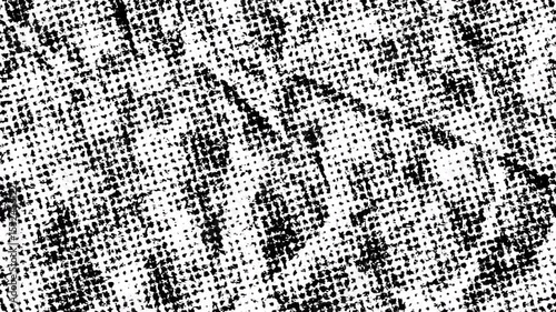 Abstract monochrome texture with dotted patterns resembling fabric or paper surface