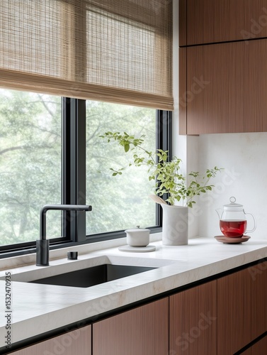 Modern kitchen design featuring white marble countertop and wooden cabinets