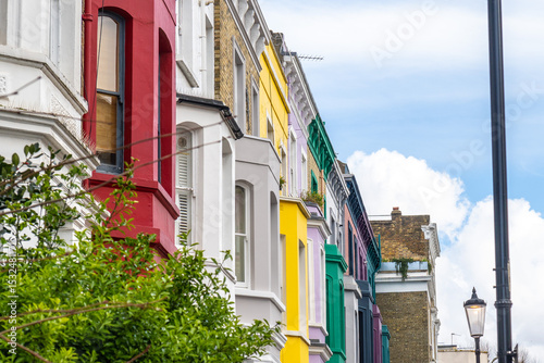 Photography Colorful houses creating a vibrant street scene in notting hill, london