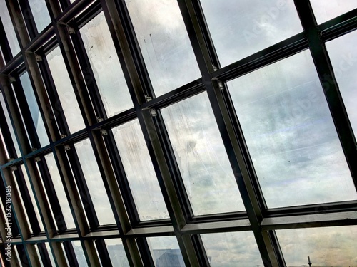 Modern skylight glass roof with geometric metal frames