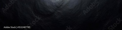 Intensely black metallic foil, highly polished, smooth areas , texture, gleam