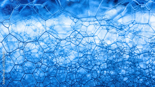 Macro photography of blue soap bubbles forming complex geometric patterns abstract concept
