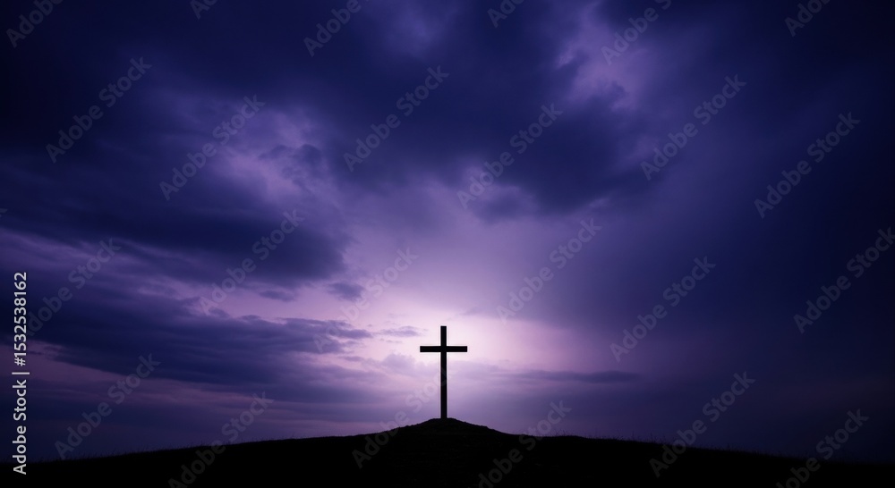 Naklejka premium Christian cross silhouette on hill against dramatic dark purple sky with light