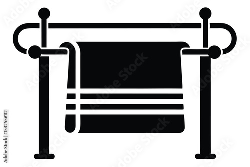 Stylized Black and White Towel Rack with Folded Towel Hanging Upon It