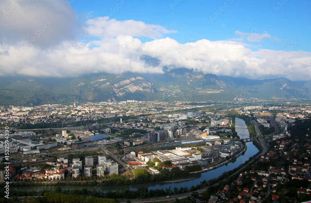 Fototapeta premium Aerial view at the city Grenoble, the river Isere and the french alps, France