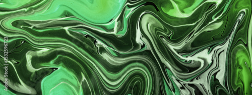 Green emerald abstract fluid art background with marble texture effect in acrylic pour painting style