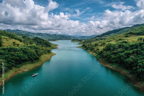 Serene river valley landscape with boat