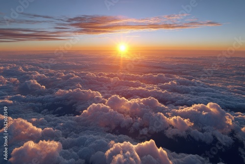 Sunset above a sea of clouds aerial view of golden hour