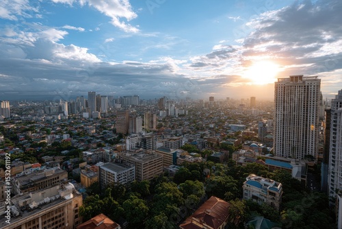 Cityscape view with tall buildings and trees under a cloudy sky at sunset time