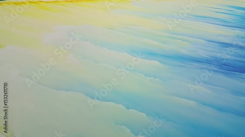  Cool blue and soft yellow watercolor spread in motion