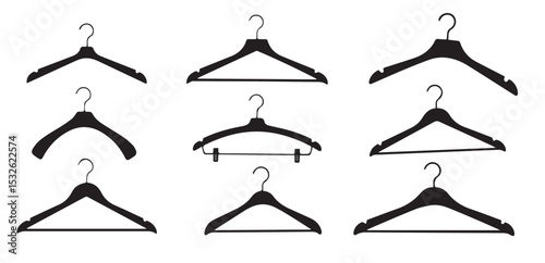 Silhouetted collection of various clothes hangers