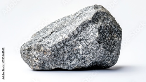 A Rough Grey Granite Stone Isolated on White Background Showing its Natural Texture and Irregular Shape Ideal for Construction or Landscaping Projects