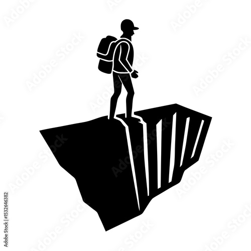 Hiker with backpack looking over cliff
