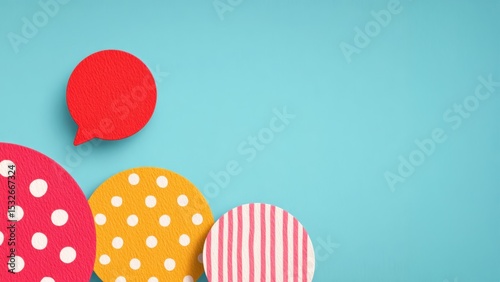 Colorful Paper Speech Bubbles on a Bright Blue Background for Creative Communication and Marketing Design Concepts
