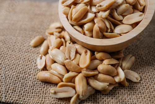 Salted Peanuts in wooden bowl