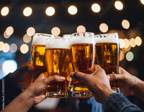 Several beer glasses clinked