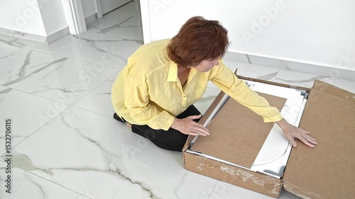 Unboxing and Preparing Furniture for Assembly in a Cozy Apartment